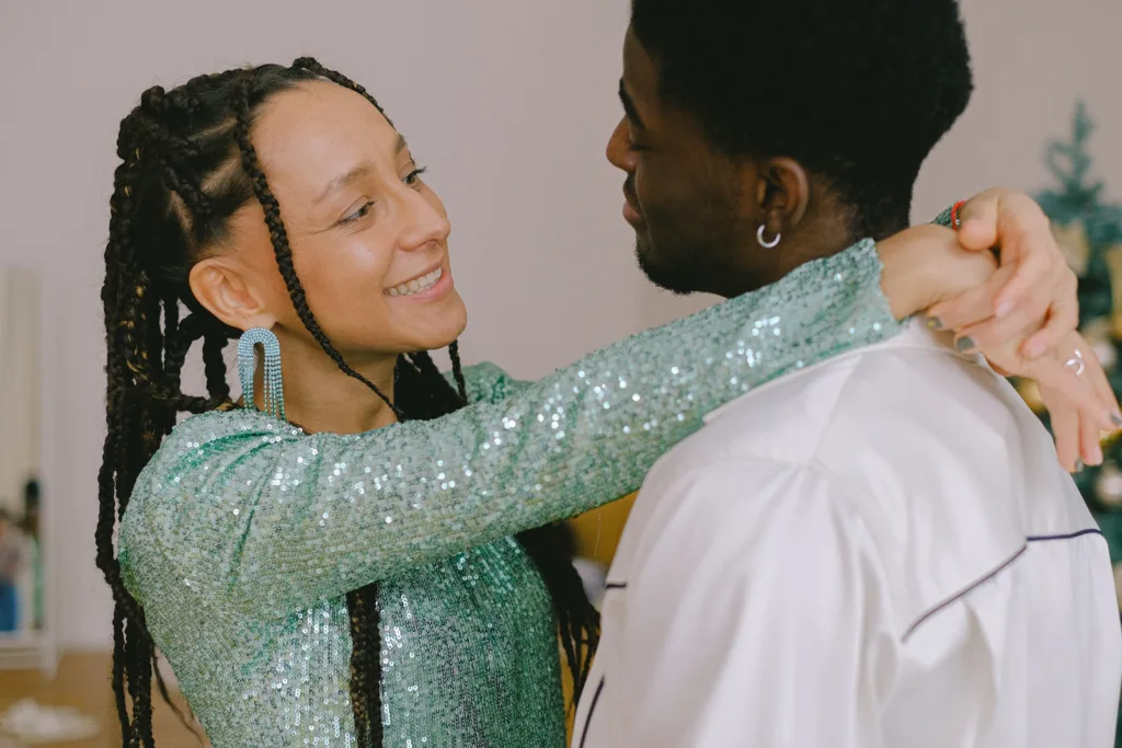 A Couple Embracing while Looking at Each Other, showing their interracial love and interracial romance in interracial relationships.