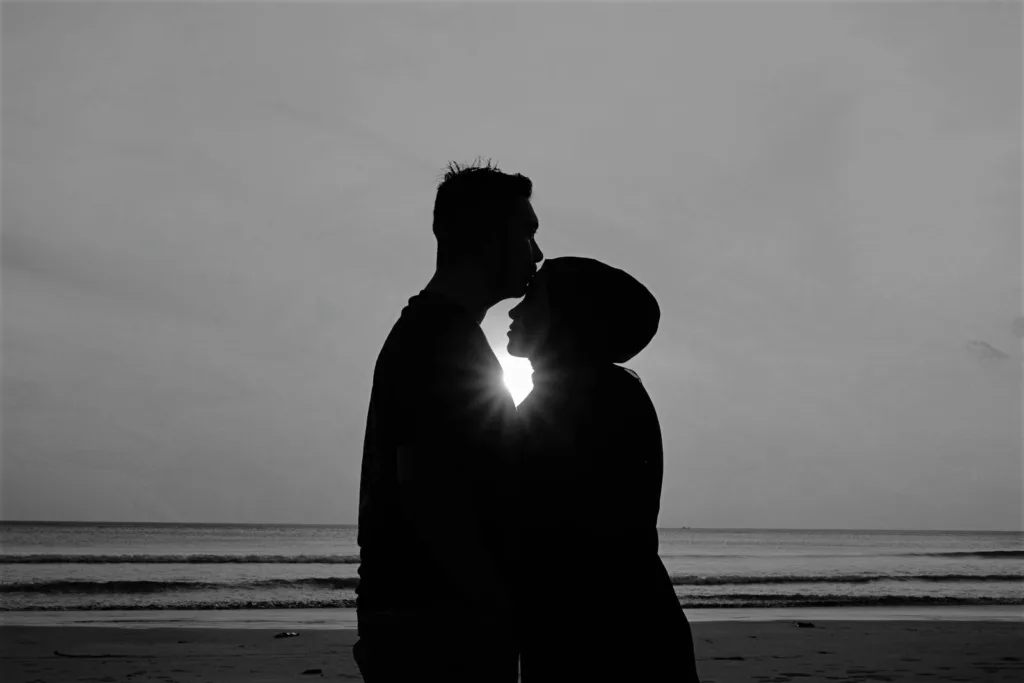Silhouette of Man and Woman Standing on Beach. Love My Ex, Emotions and memories