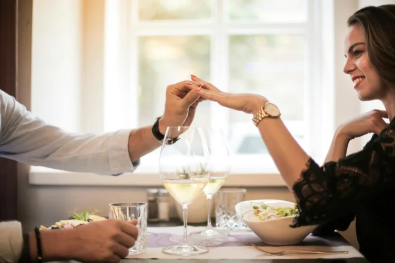 Crop man making proposal in luxurious restaurant during dinner. Romantic gestures, show your love